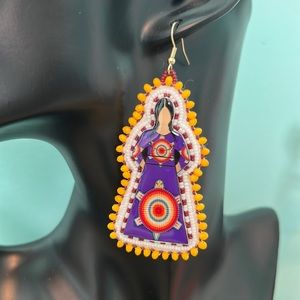 Beaded cabochon earrings.